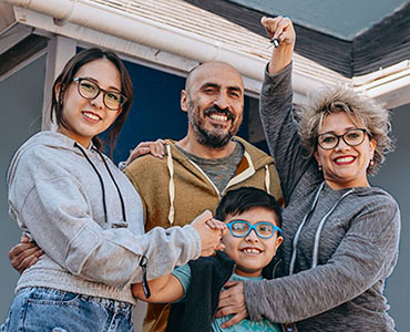 family with a key to their home
