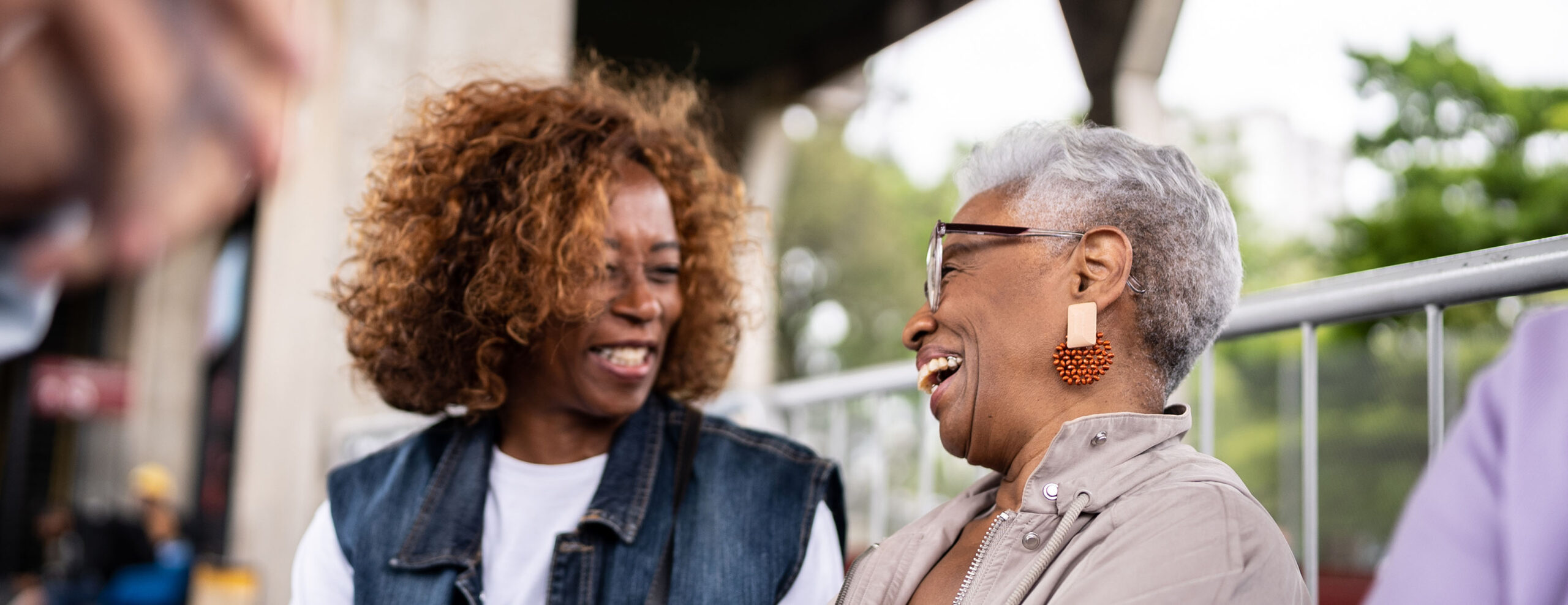 Two happy women in conversation